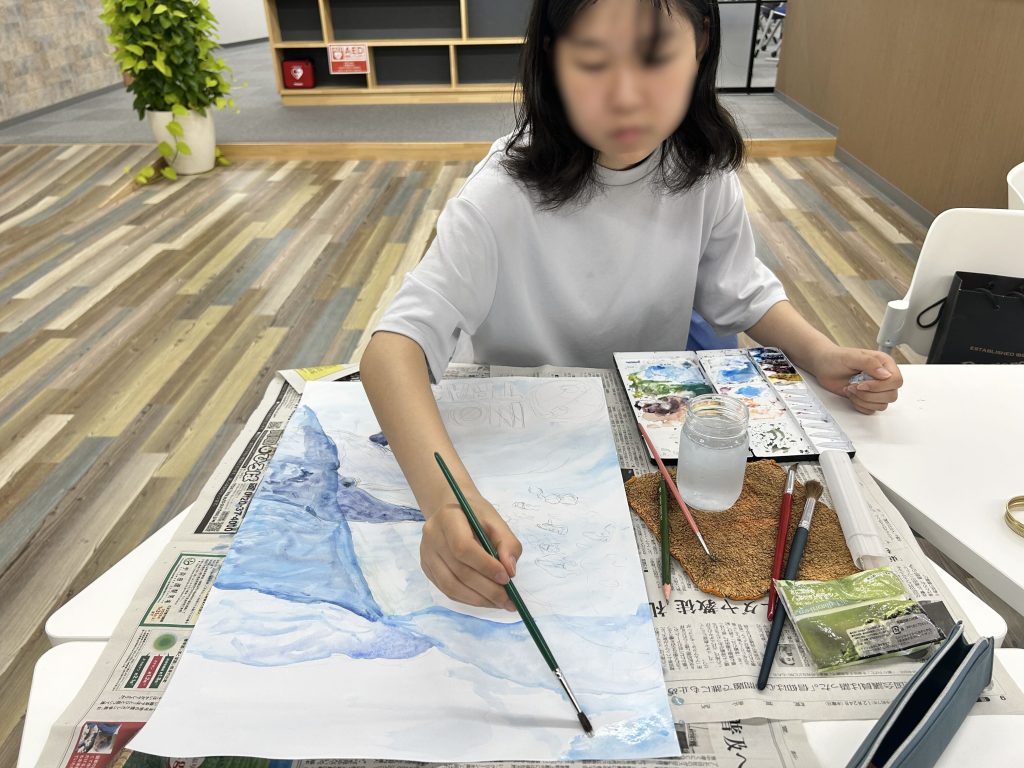 埼玉県所沢市にあるフリースクール、クラーク国際中等部所沢キャンパスで行った、環境ポスター制作の様子